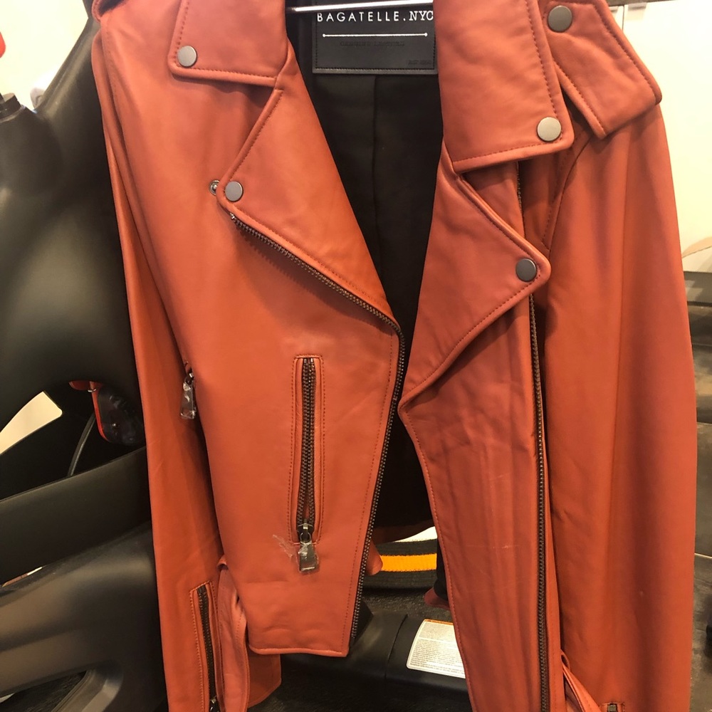 Women’s real leather motorcycle jacket. Brand New. Size L